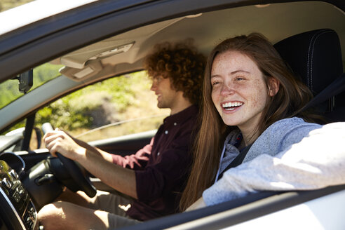 Young couple in car - SRYF00576