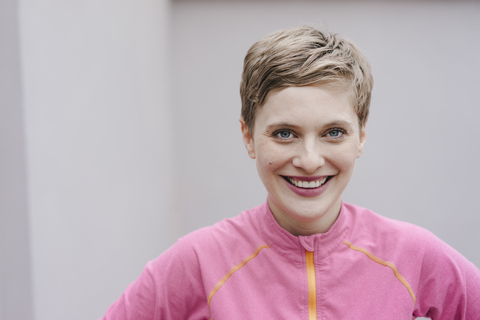 Portrait of smiling woman in sportswear stock photo