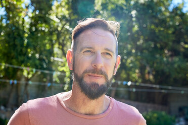 Portrait of bearded man outdoors - SRYF00670