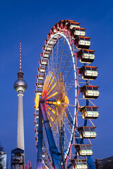 Germany, Berlin, TV Tower, Big Wheel at Christmas Market Alexander Square, blue hour - JHEF00037