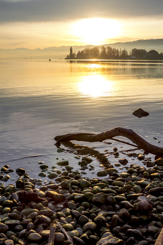 Schweiz, Thurgau, Bodensee, Romanshorn im Winter bei Sonnenuntergang, lizenzfreies Stockfoto