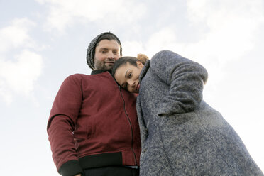 Portrait of smiling young couple outdoors - HHLMF00079