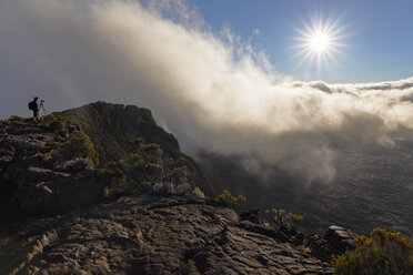 Reunion, Reunion National Park, Shield Volcano Piton de la Fournaise, Photographer at Pas de Bellecombe against the sun - FOF09616