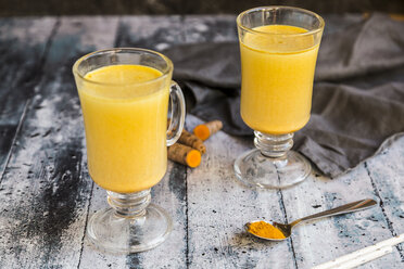 Two glasses of curcuma milk - SARF03458