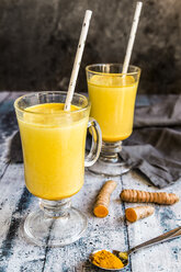 Two glasses of curcuma milk - SARF03459