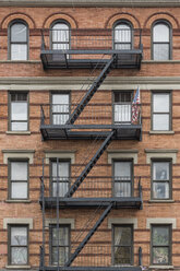 USA, New York City, Manhattan, building with fire escape - RPSF00122