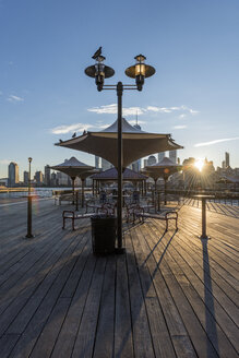USA, New York City, Manhattan, New Jersey, waterfront at sunset - RPSF00132
