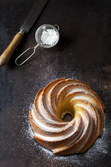 Home-baked Gugelhupf sprinkled with icing sugar - CSF28742