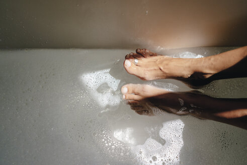 Woman taking footbath, partial view - KNSF03464