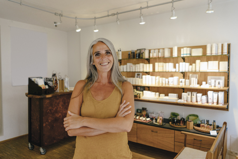 Portrait of smiling businesswoman in her shop stock photo