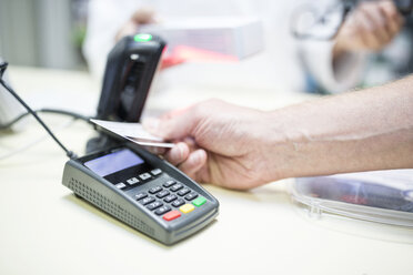 Cashless payment at shop counter - WESTF23923