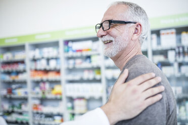 Smiling customer in pharmacy - WESTF23941