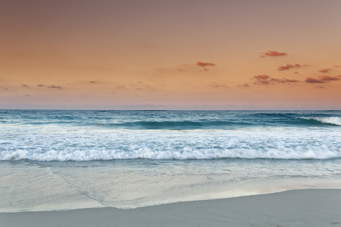 Carribean, Dominican Republic, Punta Cana, Playa Bavaro, view to the sea at sunset stock photo