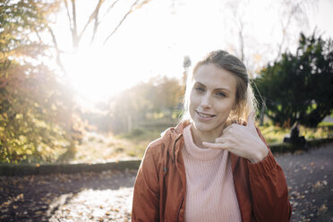 Portrait of young woman in autumnal park - JOSF02151