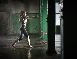 Woman having martial arts training - CVF00008