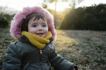 Portrait of happy toddler in winter by sunset - GEMF01842