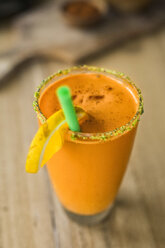 Orange smoothie with carrots and lemon slice - SBOF01238