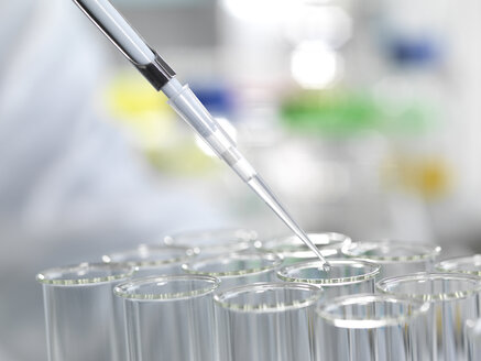 Sample being pipetted into test tubes during a laboratory experiment - ABRF00033