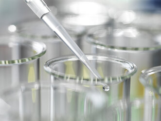 Sample being pipetted into test tubes during a laboratory experiment - ABRF00035