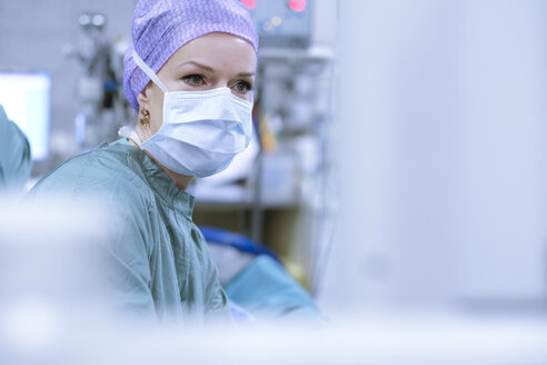 Surgeon in scrubs during an operation - MWEF00194