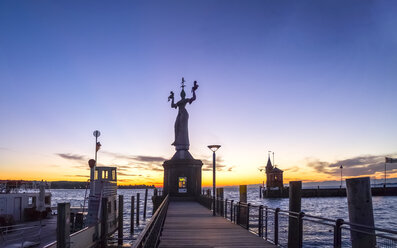 Germany, Baden-Wuerttemberg, Constance, Lake Constance, Impera at harbour entrance, sunrise - PUF01090