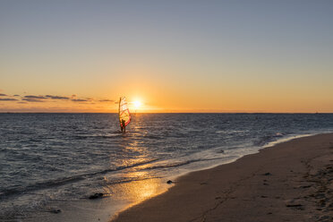 Mauritius, Le Morne, Indian Ocean, sail boarder at sunset - FOF09768