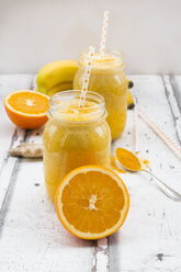 Orange banana smoothie with ginger and curcuma - LVF06614