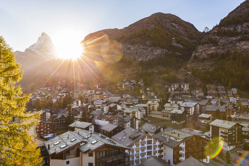 Switzerland, Valais, Zermatt, Matterhorn, townscape, chalets, holiday homes at sunset - WDF04326