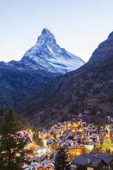 Switzerland, Valais, Zermatt, Matterhorn, townscape, chalets, holiday homes in the evening - WDF04331