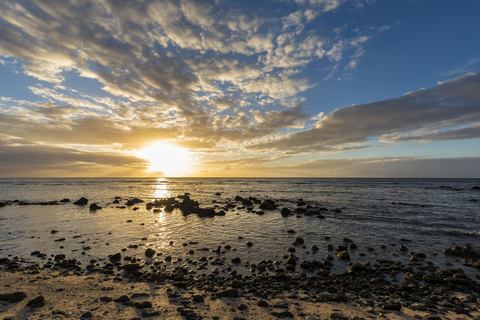 Mauritius, West Coast, Indian Ocean, beach of Trou aux Biches, sunset stock photo