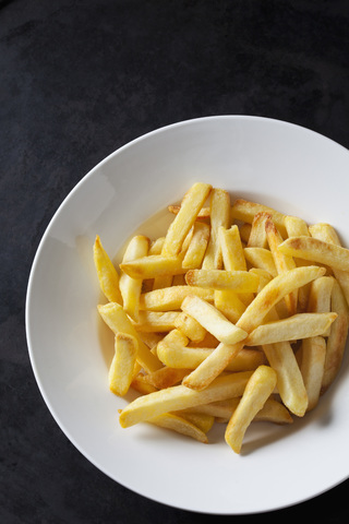 French fries on plate stock photo