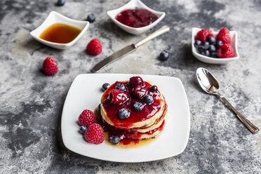 Pancakes with red fruit jelly, maple sirup, raspberry and blueberry - SARF03504