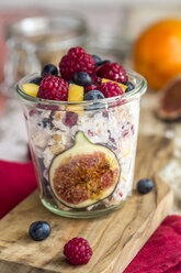 Glass of natural yogurt with granola and various fruits - SARF03507
