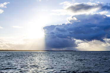 Germany, Mecklenburg-Western Pomerania, Prerow, Baltic Sea, clouds and sunshine - PUF01202