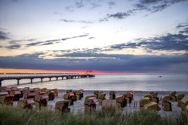 Germany, Schleswig-Holstein, Scharbeutz, coastal resort, beach at sunrise - PUF01205