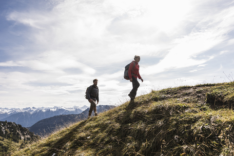 Austria, Tyrol, young couple hiking in the mountains stock photo
