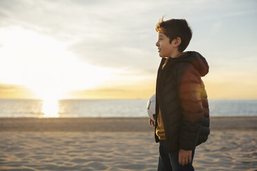 Teen Boy On Beach Holding Water Bottle High-Res Stock Photo - Getty Images