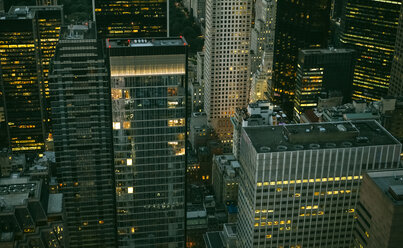 USA, New York, Manhattan, high-rise buildings at night - DAPF00880