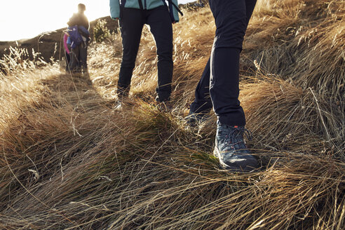 Close-up of people hiking in the mountains - PNEF00455