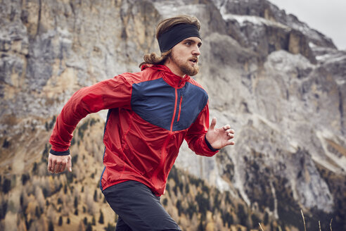 Man running in mountains - PNEF00466