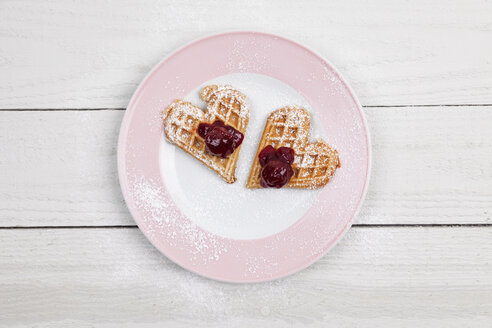 Homemade waffels with cherries, waffel hearts for two on plate - GWF05418