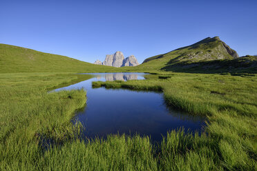 Italy, Province of Belluno, Dolomites, Selva di Cadore, Monte Pelmo reflecting in Lago delle Baste - RUEF01807