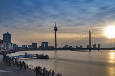 Germany, North Rhine-Westphalia, Duesseldorf, Rhine Tower, Rhine riverbank, high water in the evening - FRF00633