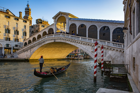 Italy, Veneto, Venice, Gondola on Canal Grande in front of Rialto Bridge stock photo