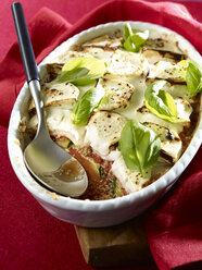 Courgette gratin with goat cheese, sesame in gratin dish, low carb - SRSF00639