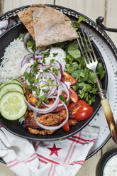 Gyros, rice, chicken, salad, tomato, cucumber, onion, tzatziki, homemade pita bread - SBDF03451