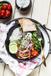 Gyros, rice, chicken, salad, tomato, cucumber, onion, tzatziki, homemade pita bread - SBDF03452