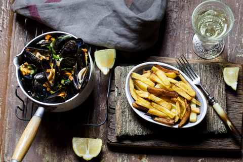 Moules-frites, blue mussel and french fries, white wine stock photo