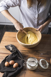 Woman stirring dough - MAUF01335