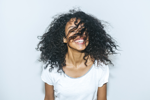 Portrait of laughing young woman stock photo